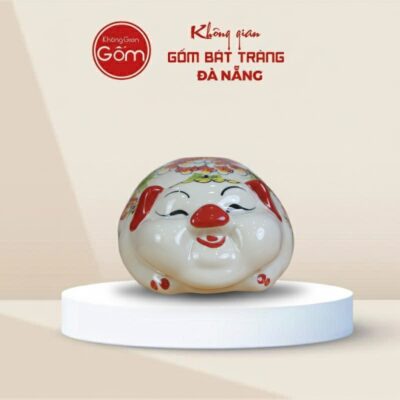 Lợn đất Bát Tràng mắt híp bụng phệ dáng nằm màu trắng mũi đỏ - Ảnh đại diện