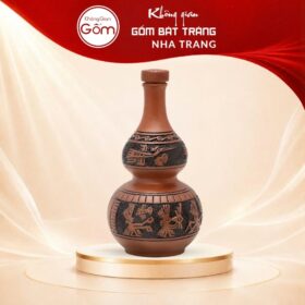 Nậm rượu gốm sứ Bát Tràng dáng hồ lô màu đỏ cam khắc hoạ tiết Đông Sơn Âu Lạc dung tích 1 lít NT-NR04 - Ảnh đại diện